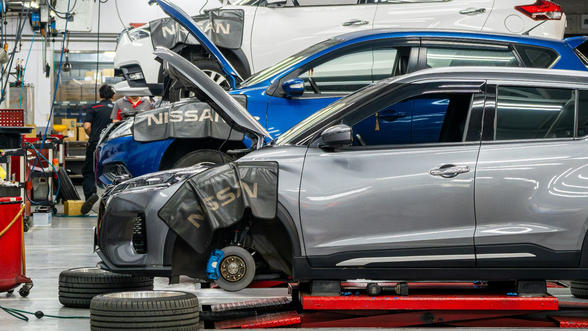 Cars being repaired in a workshop