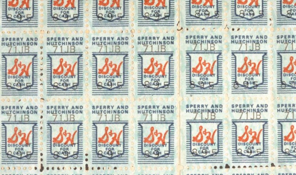 Close-up view of a page of S&H green stamps, used as food stamps to purchase goods, circa 1960.