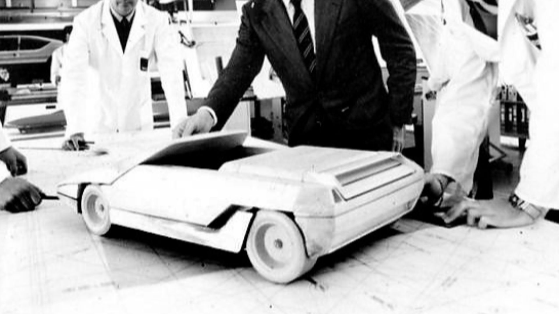 Car designer Nuccio Bertone and associates working on a model of the 1980 Lamborghini Athon.