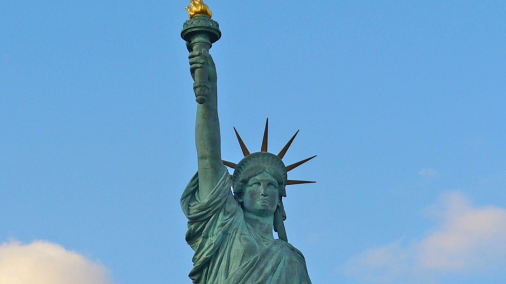 Statue of Liberty on the Île aux Cygnes in Paris, taken from a bateau-mouche.