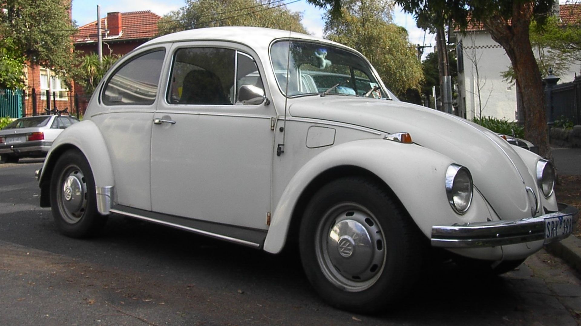 White Volkswagen Beetle.
