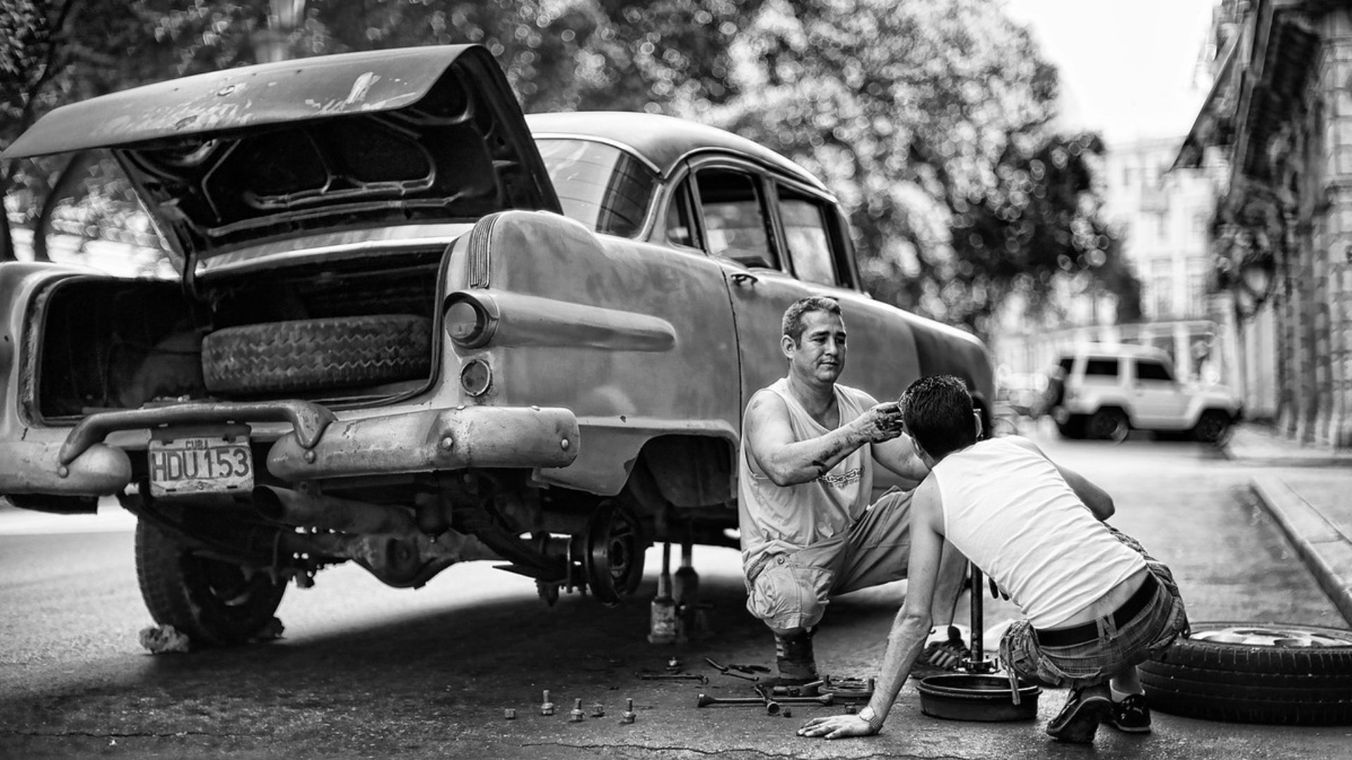In Cuba, people keep their cars for generations.  Not surprisingly, they break down with some frequency.  Here, on one of Havana's busiest streets, two friends fix an old classic.