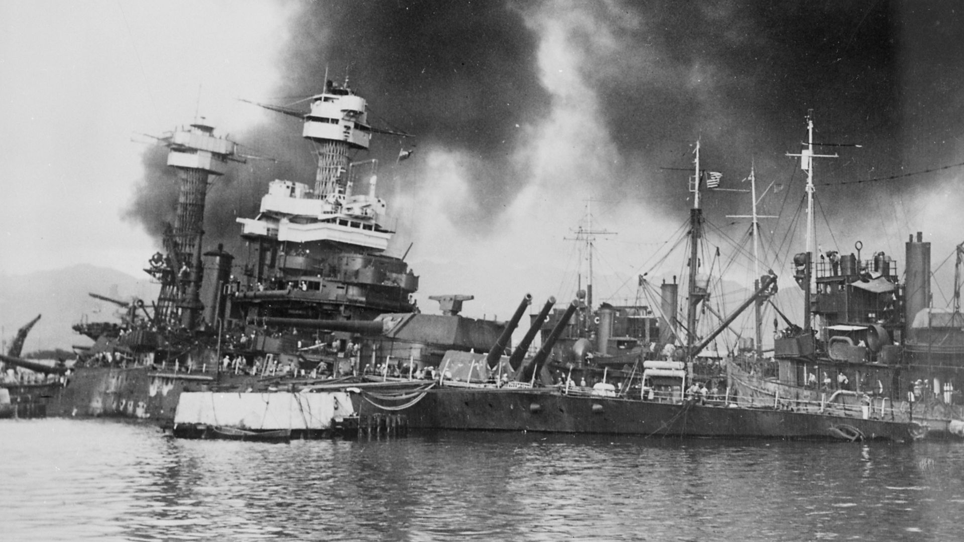 Scope and content: This photograph was originally taken by a Naval photographer immediately after the Japanese attack on Pearl Harbor, but came to be filed in a writ of application for habeas corpus case (number 298) tried in the US District Court, Distr