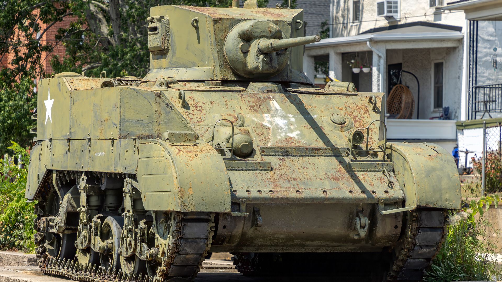 An M5 Stuart tank on a plinth on A Street, Brunswick, Maryland, USA