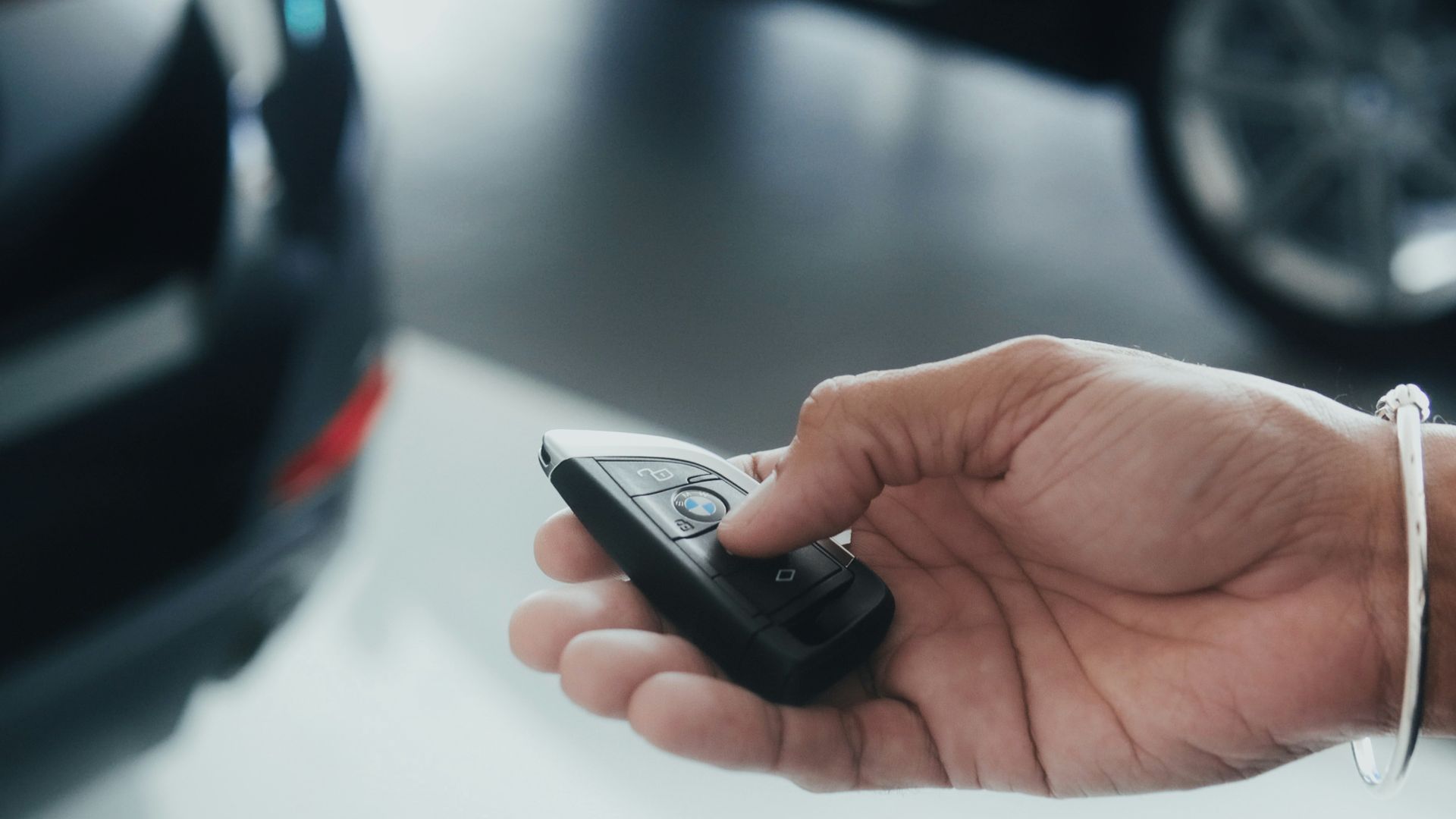 a person holding a cell phone in their hand