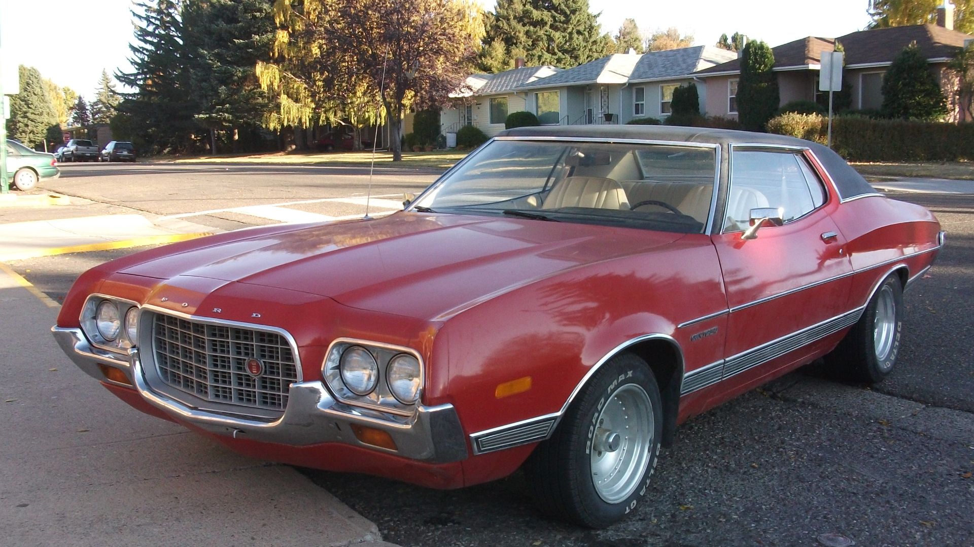 1972 Ford Torino parked at a high school.