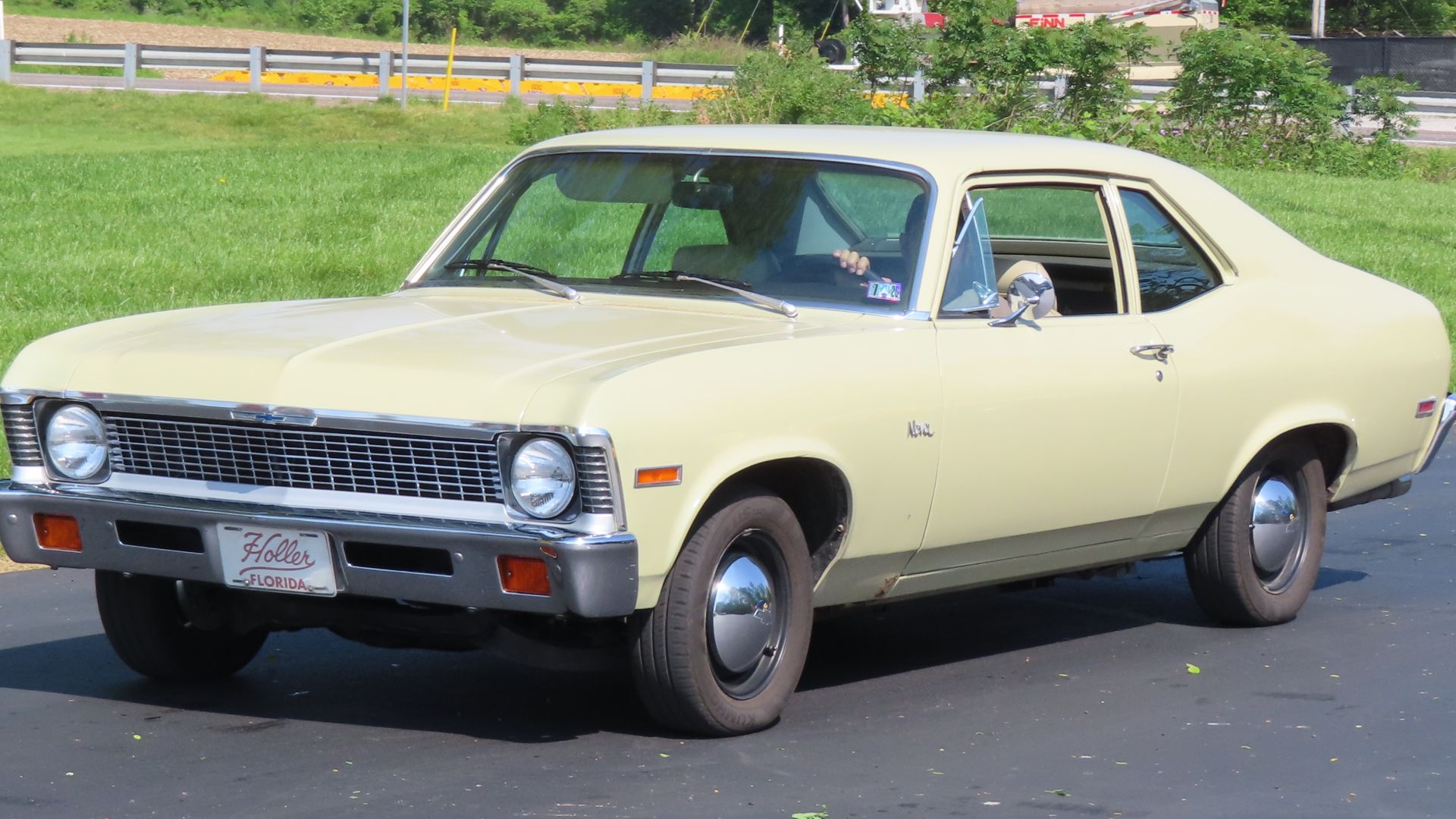 1972 Chevrolet Nova coupe photographed at a car show in New Castle, Pennsylvania. Finished in Covert Tan.
