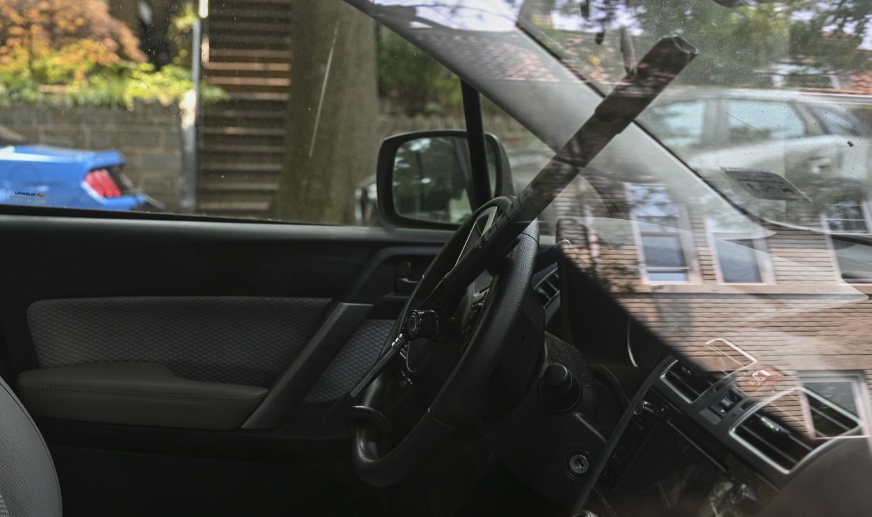 Getty Images - 1258492570 - A photo shows a steering wheel lock of a car.
