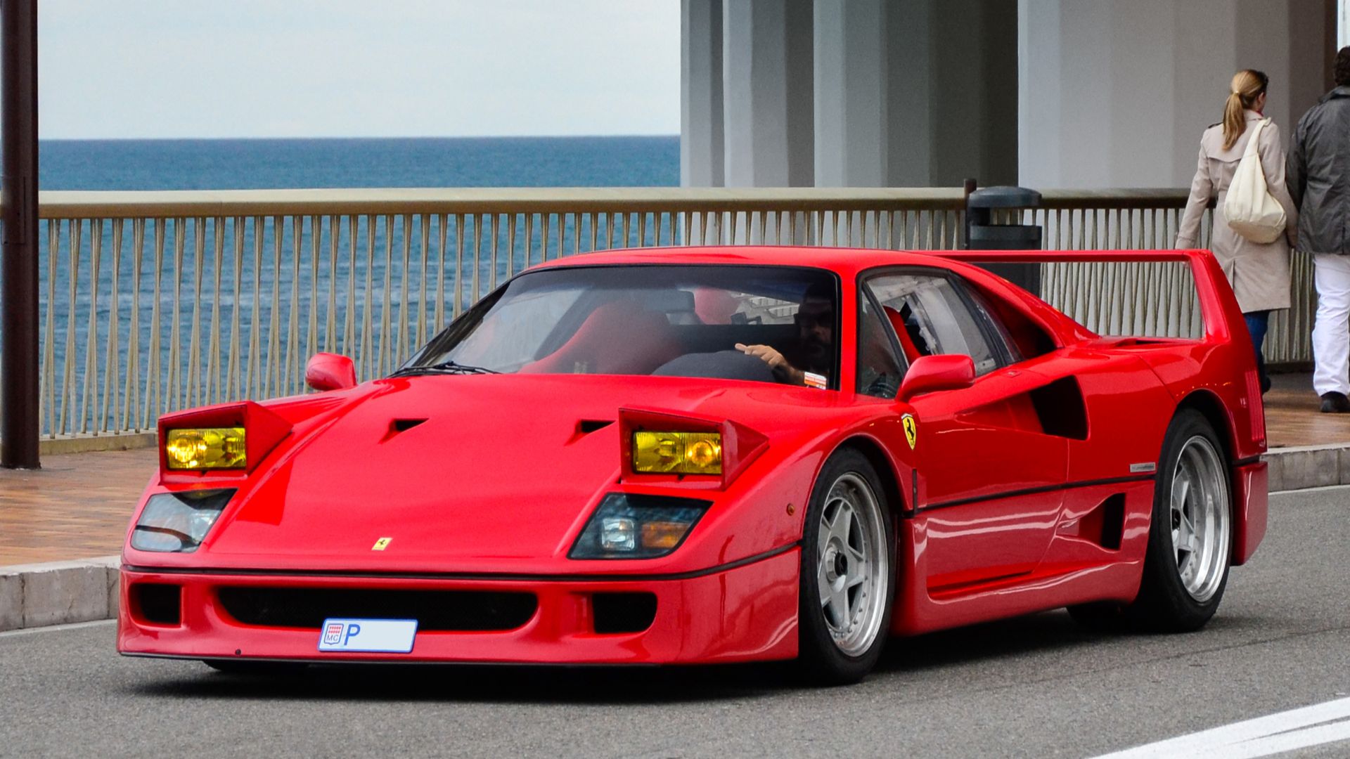 Ferrari F40 with lights open www.grand-est-supercars.com