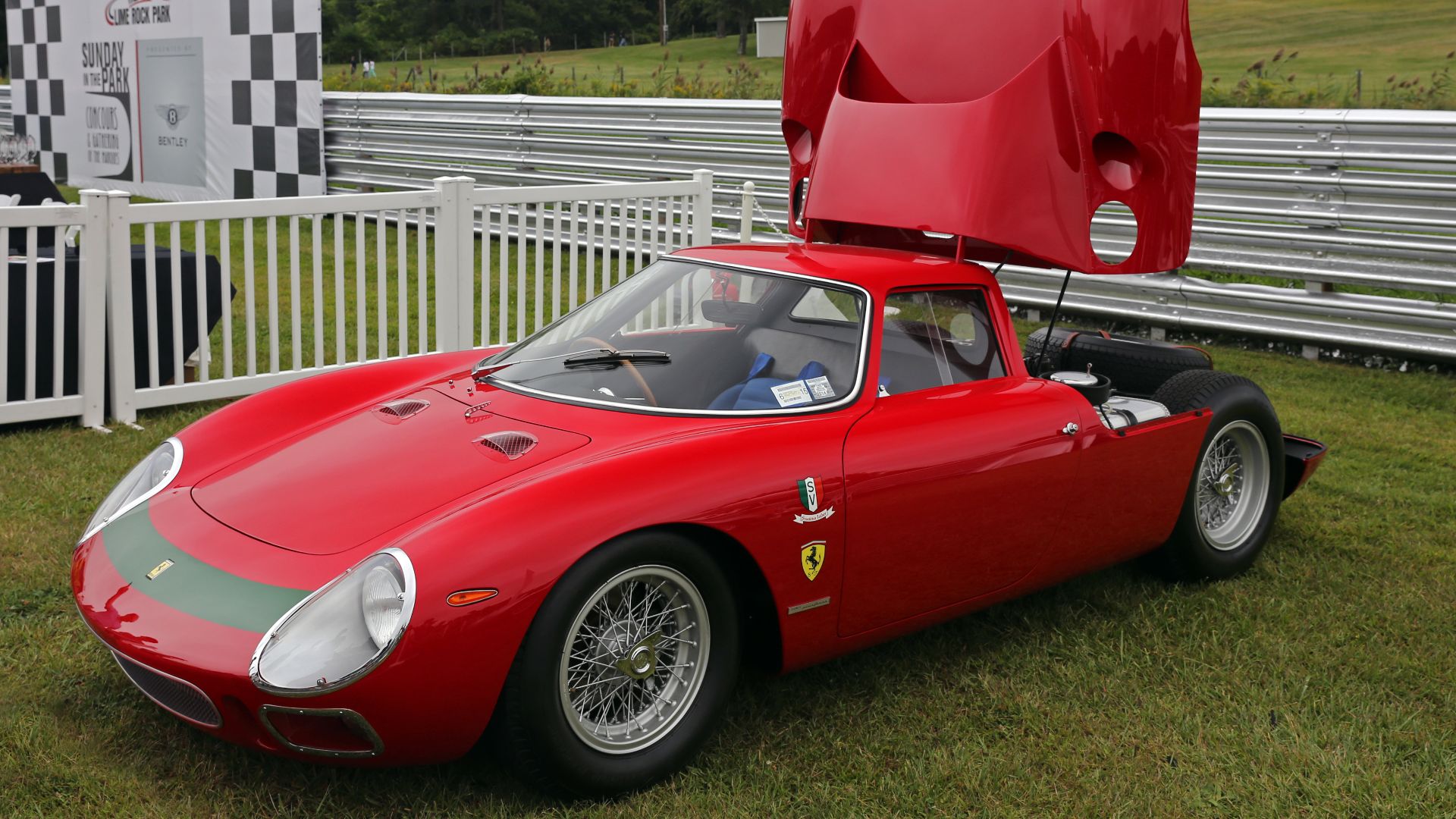 Ralph Lauren's 1964 Ferrari 250LM, seen at the 2014 Lime Rock Concours d'Élegance with its engine cover open.