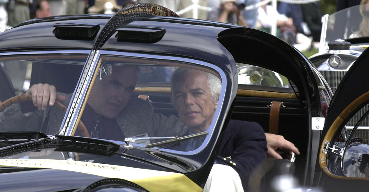 Ralph Lauren sitting in a cool car
