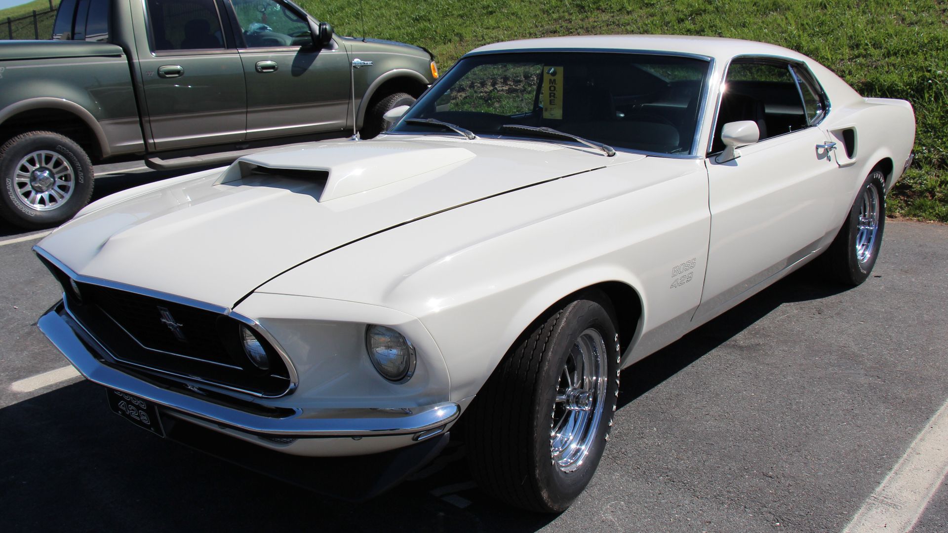 Wimbledon White. 
The 1969 Mustang got a new body, nearly 4 inches longer than the 1968 model. The Fastback was now called the Sportsroof. 
The Boss 429 was born of Ford's need to qualify 500 examples of its new racing engine for NASCAR. But instead of pu