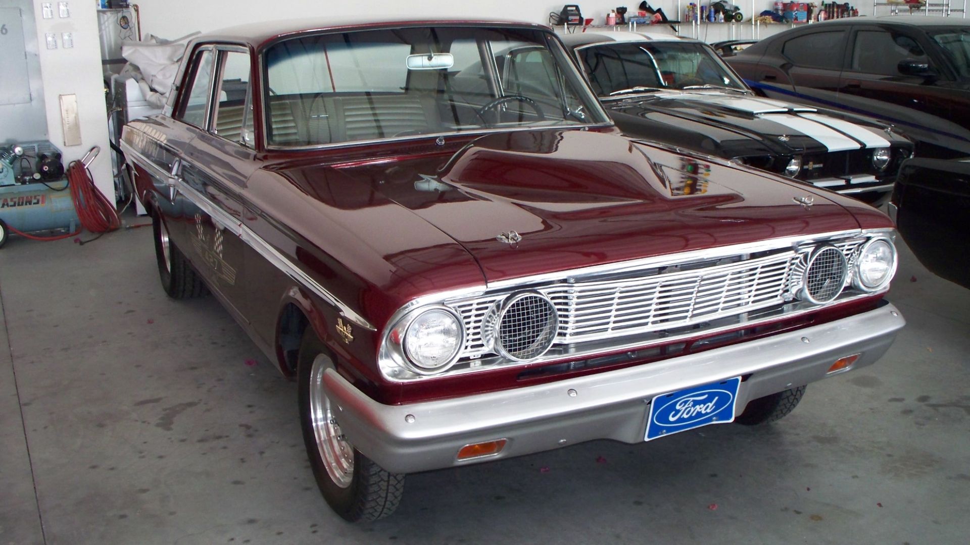 Restored, modified and street-driven 1964 Ford Fairlane Thunderbolt factory experimental drag race car.  One of only 100 such cars produced in a joint effort between the Ford Motor Company and Dearborn Steel Tubing.  Vehicle at the top right is a modified