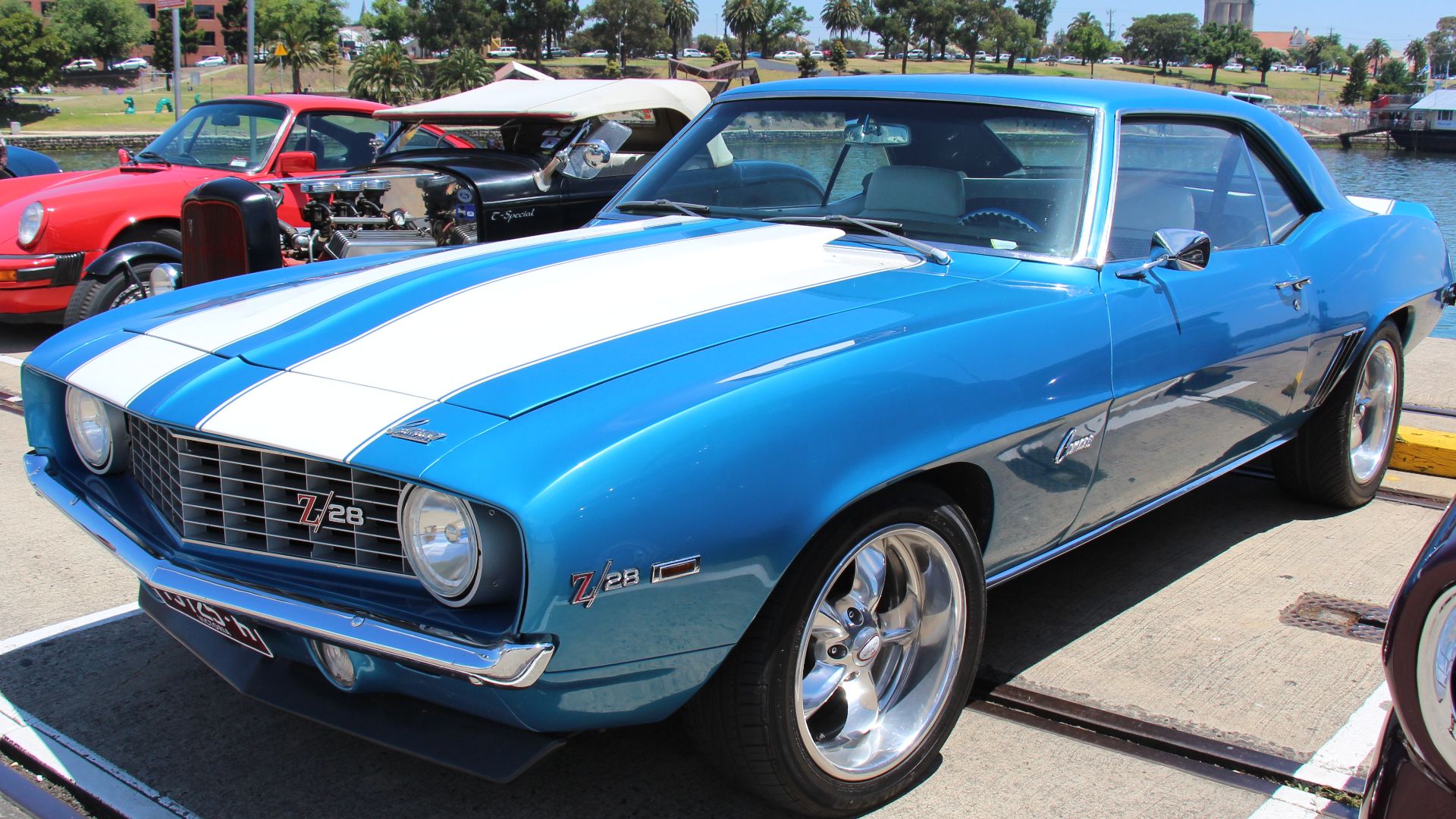 In 1969, the Camaro got all new sheet metal, except the hood and trunk lid, but the drivetrain stayed much the same, the grille got a distinctive V shape and the headlights were inset. It looked lower, wider and more aggressive.
Available in base, RS appe