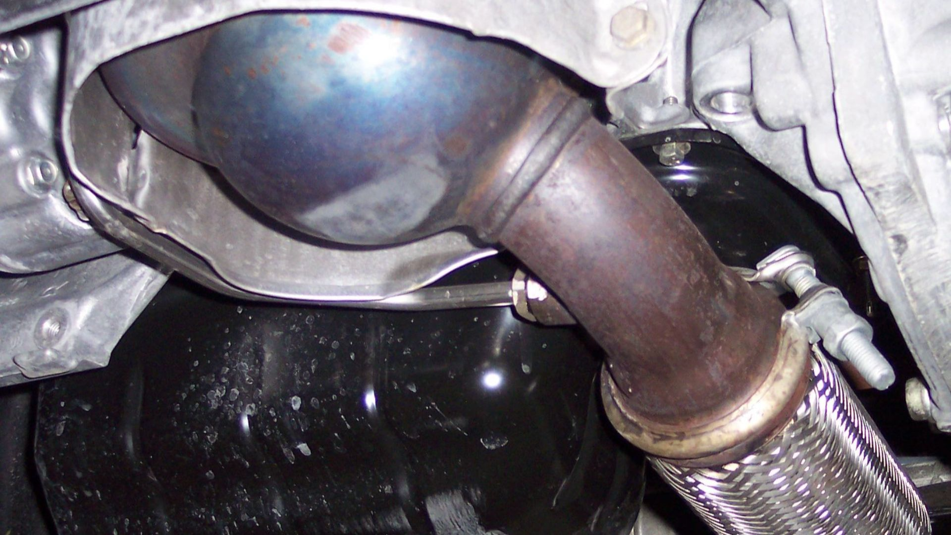 Diesel Particulate Filter (DPF) built in the exhaust pipe of a Peugeot)