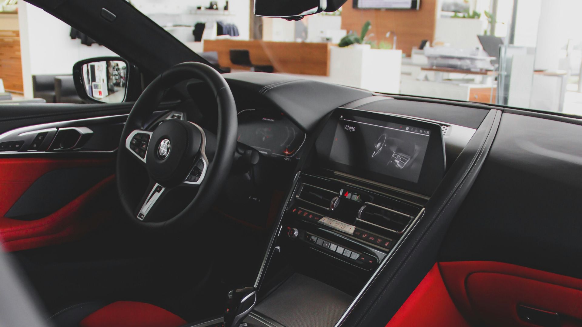 black and red car interior during daytime