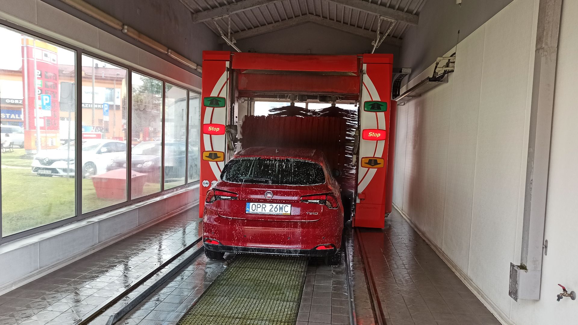 Car wash 2 Wiejska Street in Prudnik and Fiat Tipo 1.4 HB car, Poland.