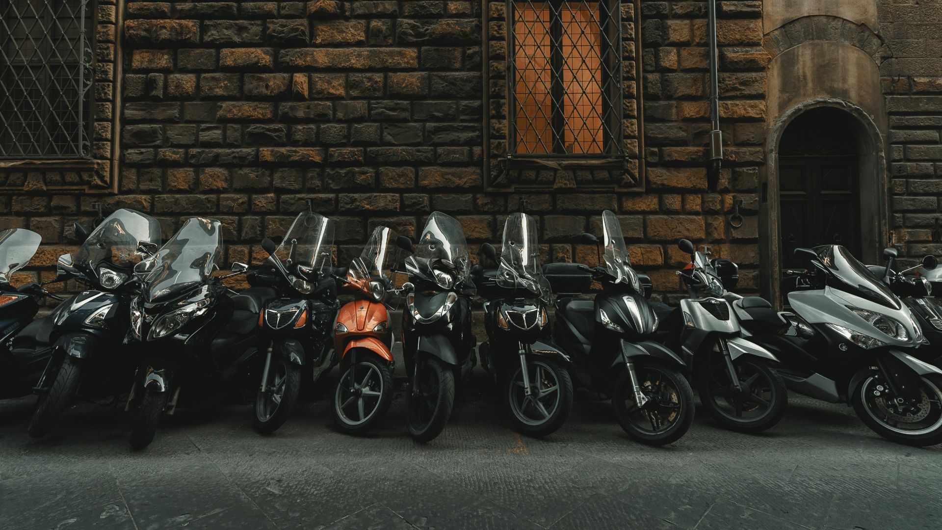 motorcycles park near building