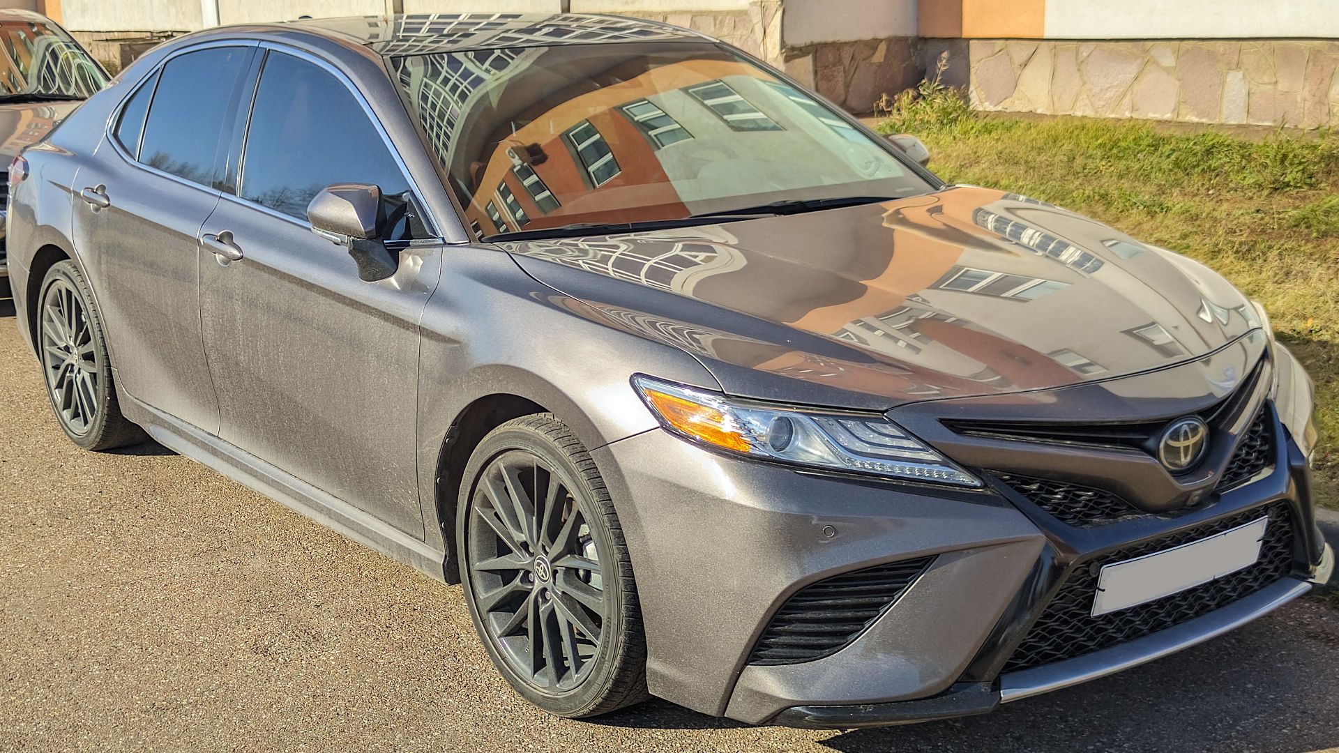 Front view of a grey Toyota Camry XSE