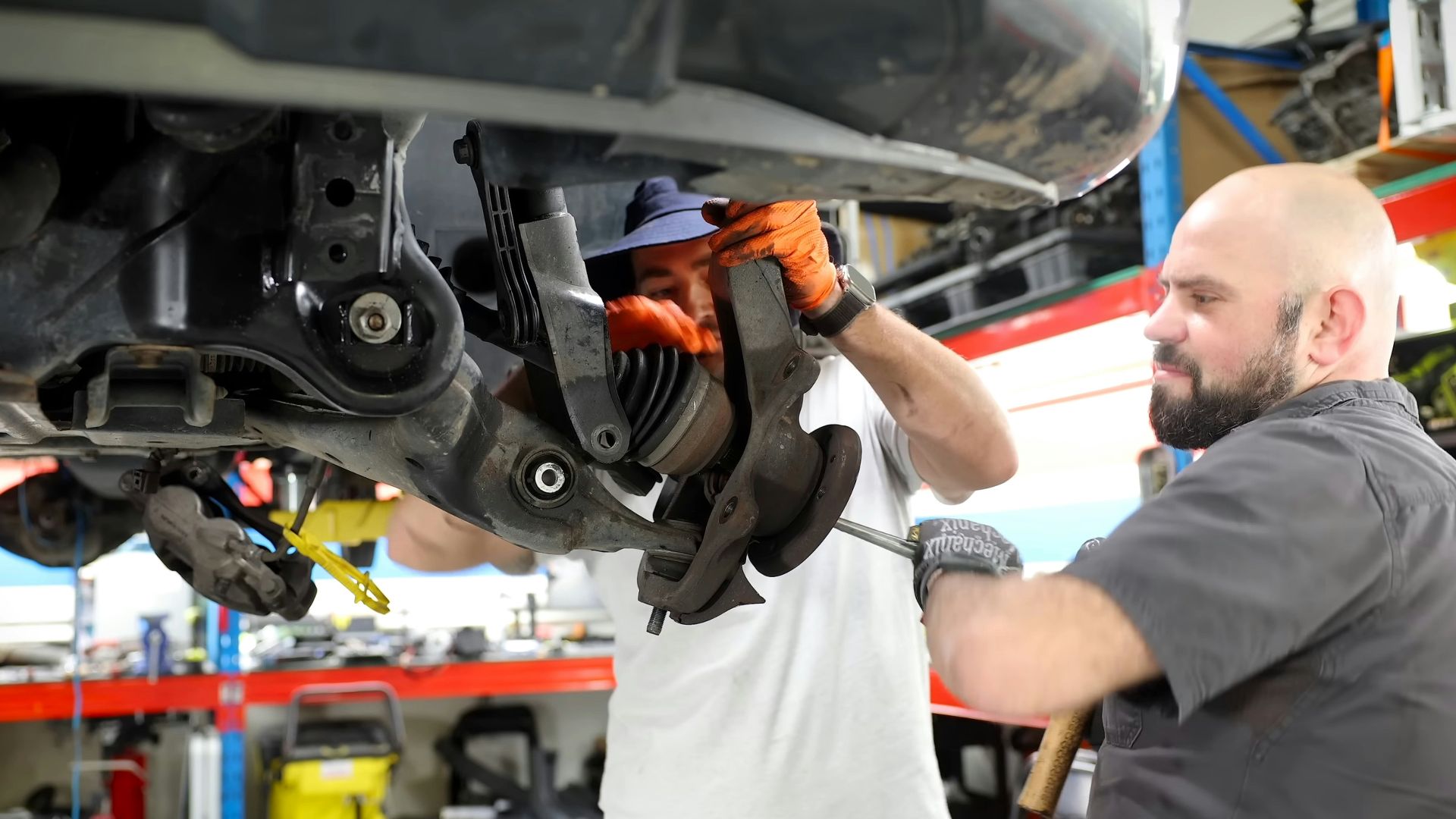 A man working on a car in a garage