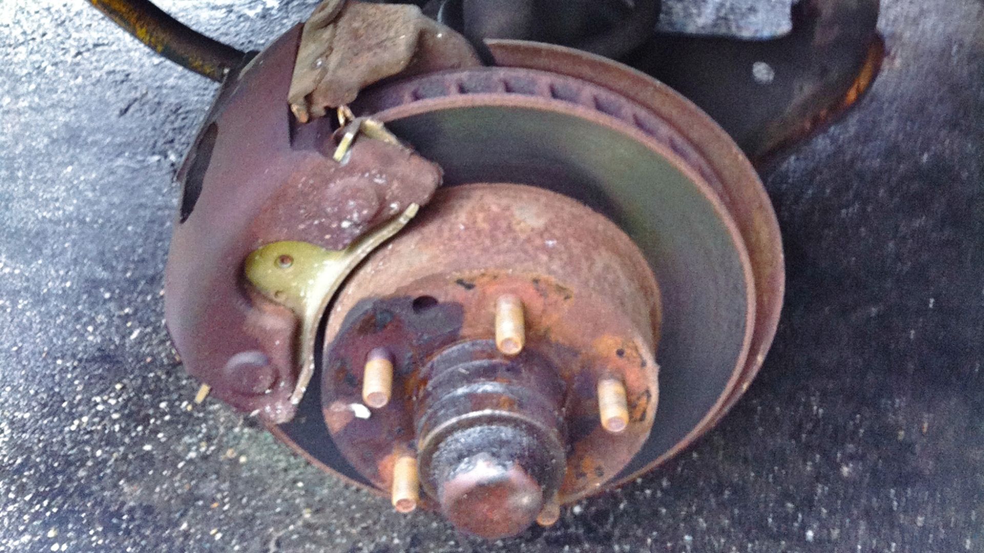 Detail of the AMC Pacer (made by American Motors Corporation) right front disc brake and isolated suspension system. Picture taken of an automobile in road use, not a show car!