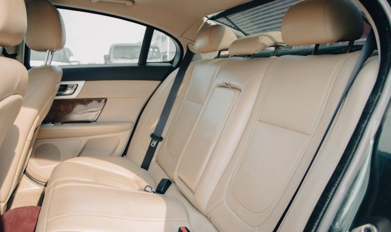 Explore the comfortable and elegant leather interior of a sedan car, showcasing premium craftsmanship