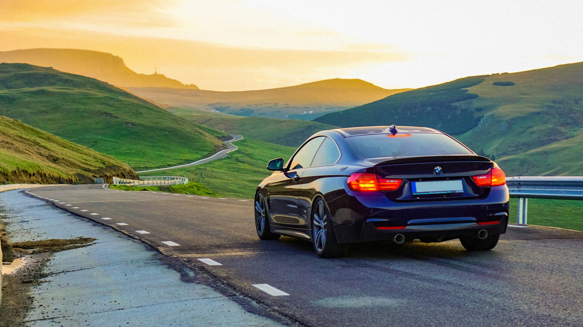 black car on road during daytime