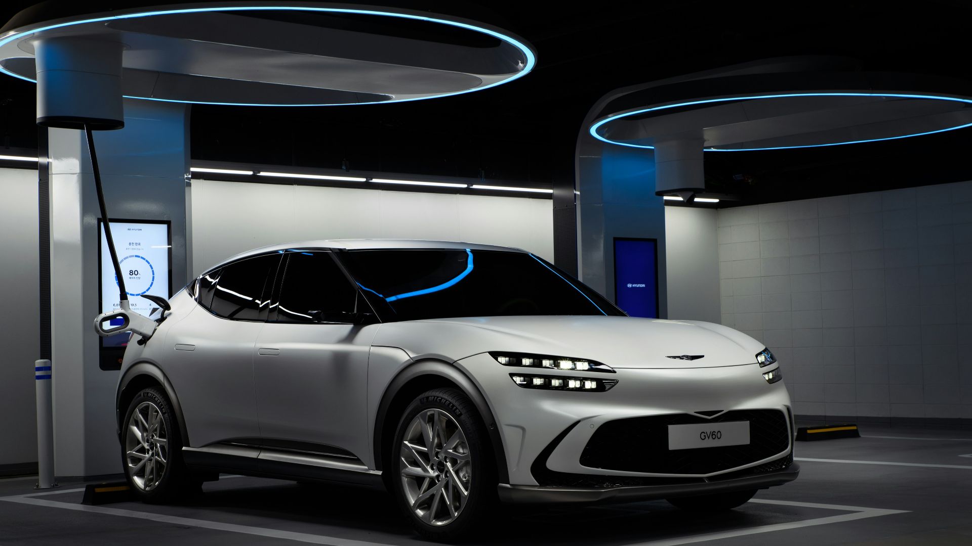 a white sports car in a showroom