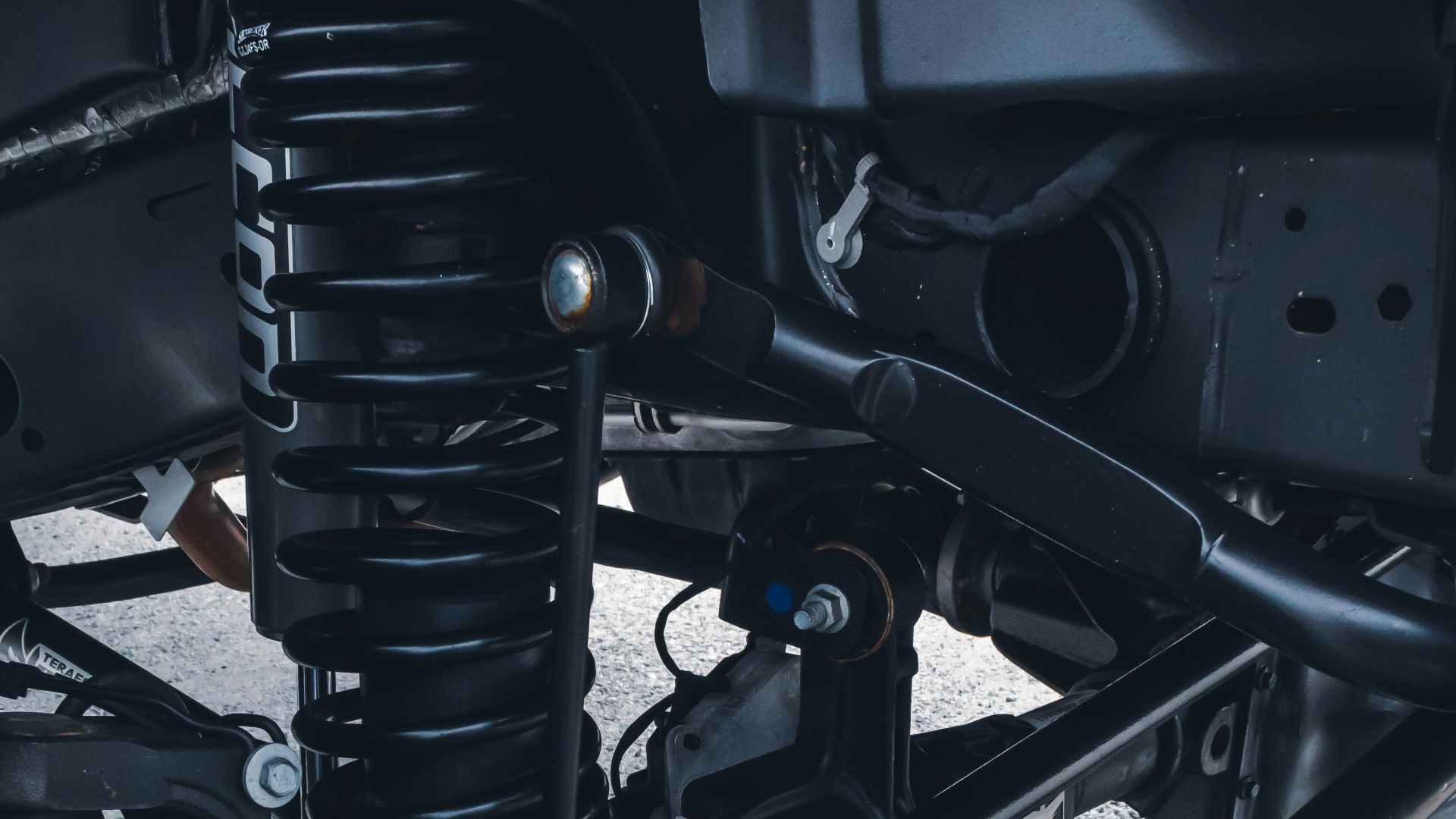a close up of the front suspension of a motorcycle