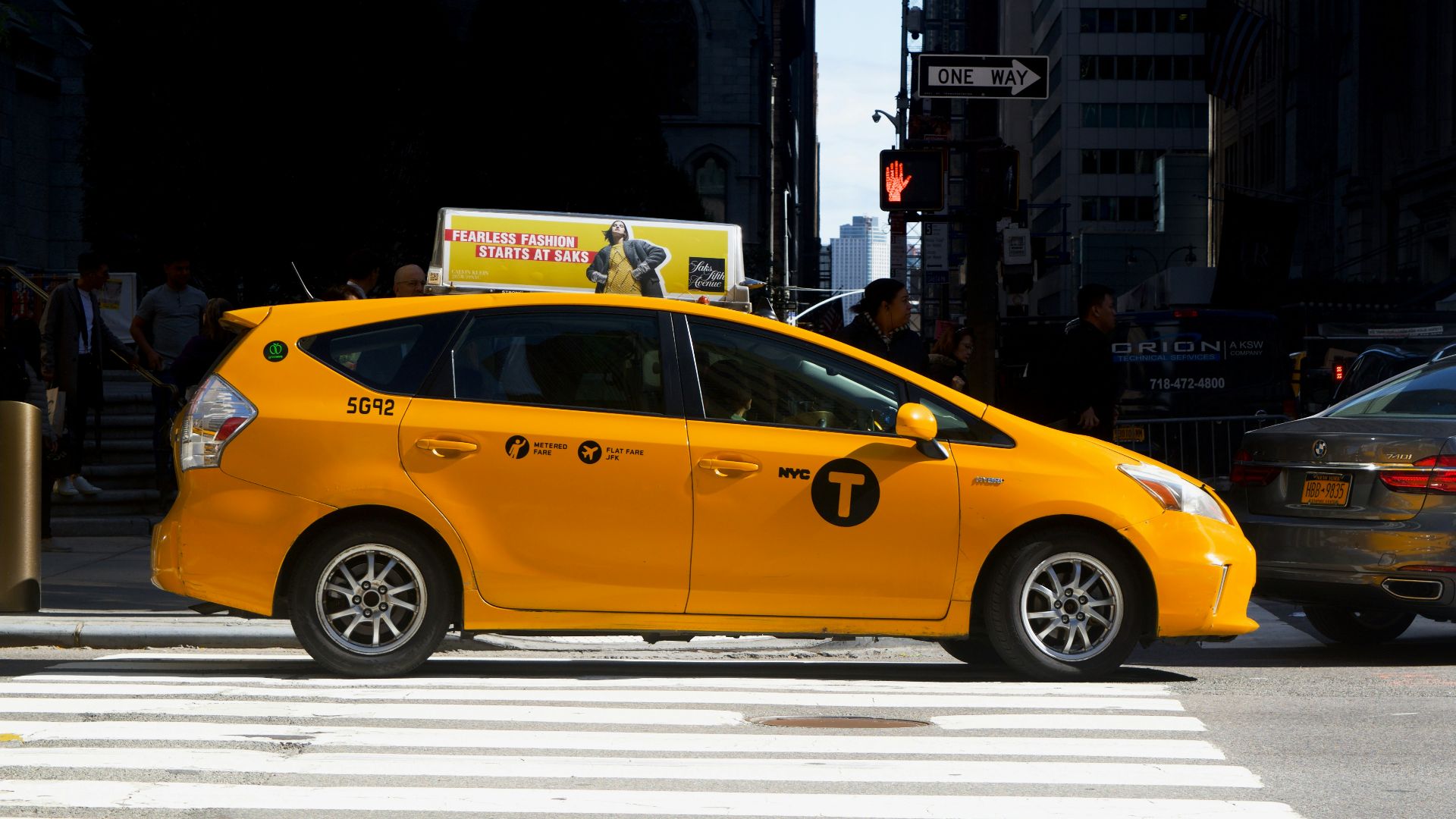 yellow car on road