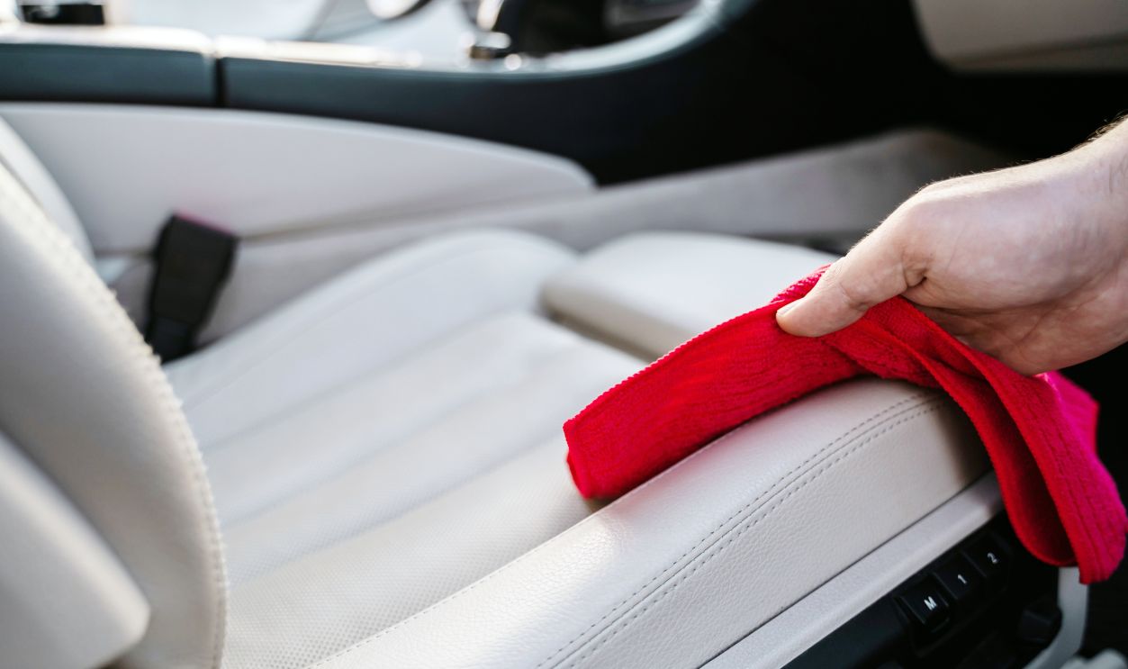 The interior of the car is painted beige with a special detergent-foam for cleaning, self-service car wash.