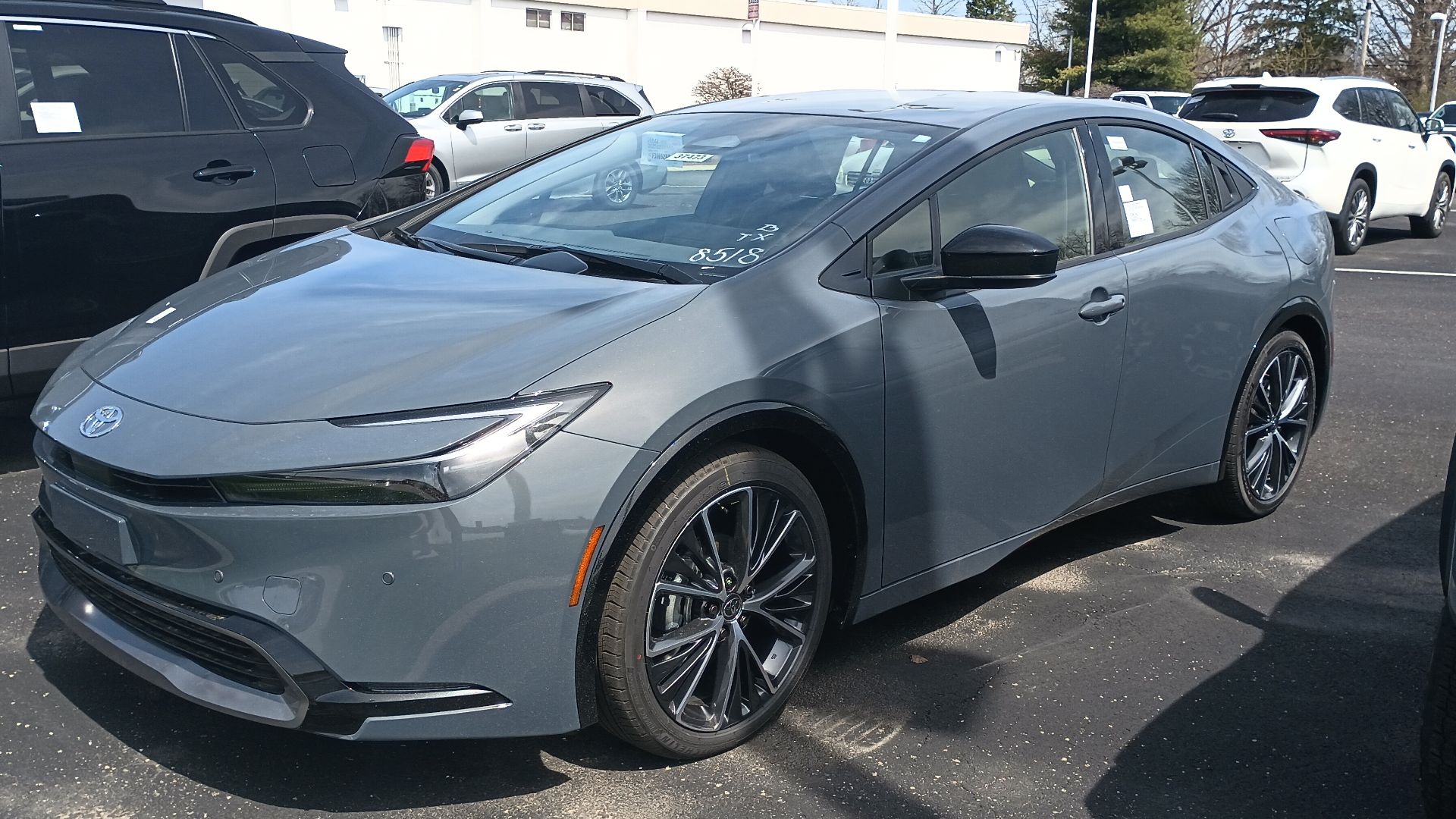 Front view of a 2023 Toyota Prius HEV XLE hybrid liftback.