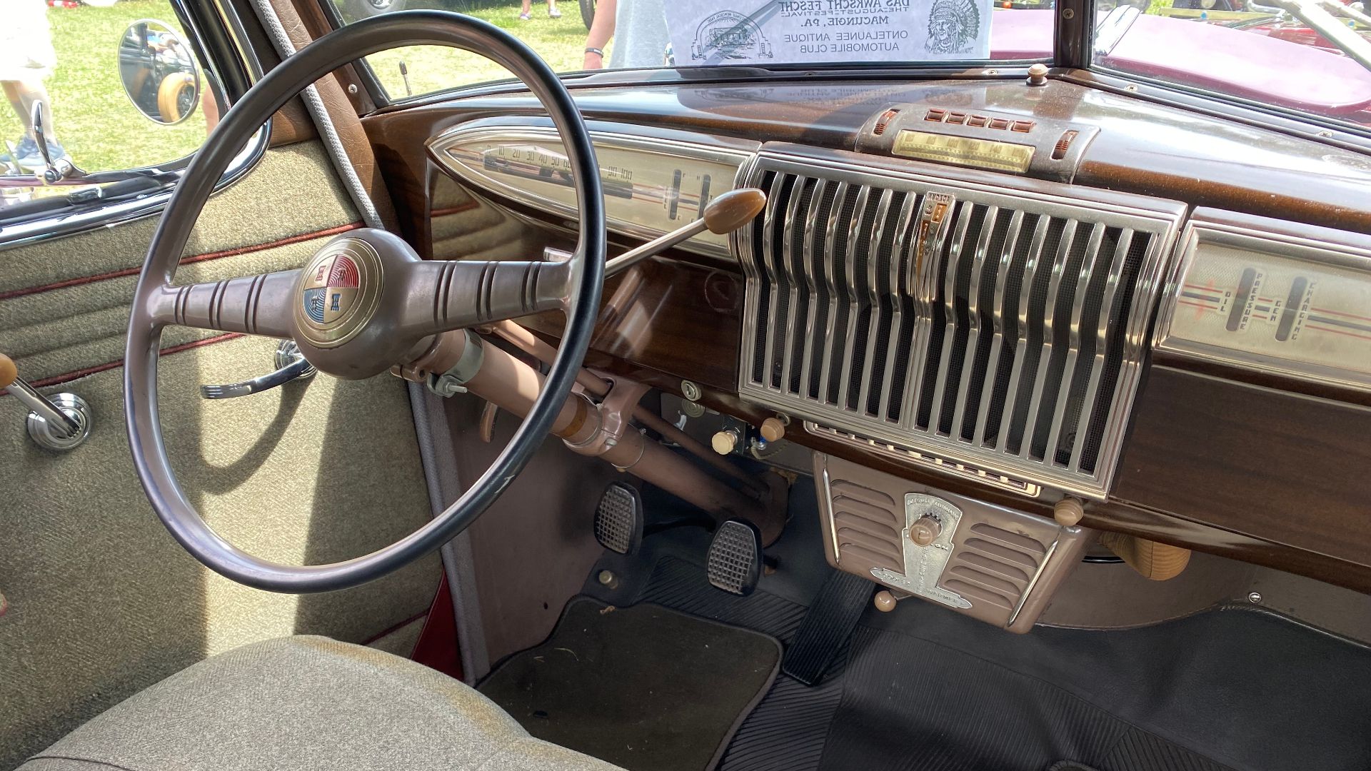 1940 Hudson Coupe finished in burgundy and interior in gray Hockanum woolen upholstery. 
These pictures were taken at the 2021