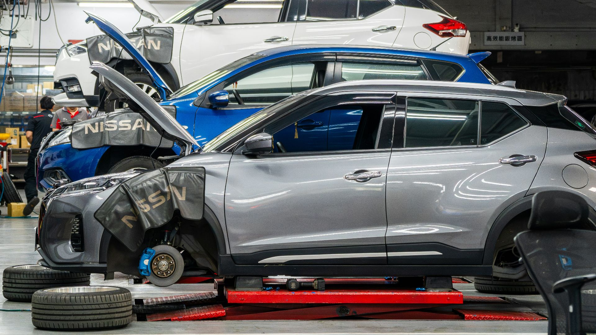 Cars being repaired in a workshop