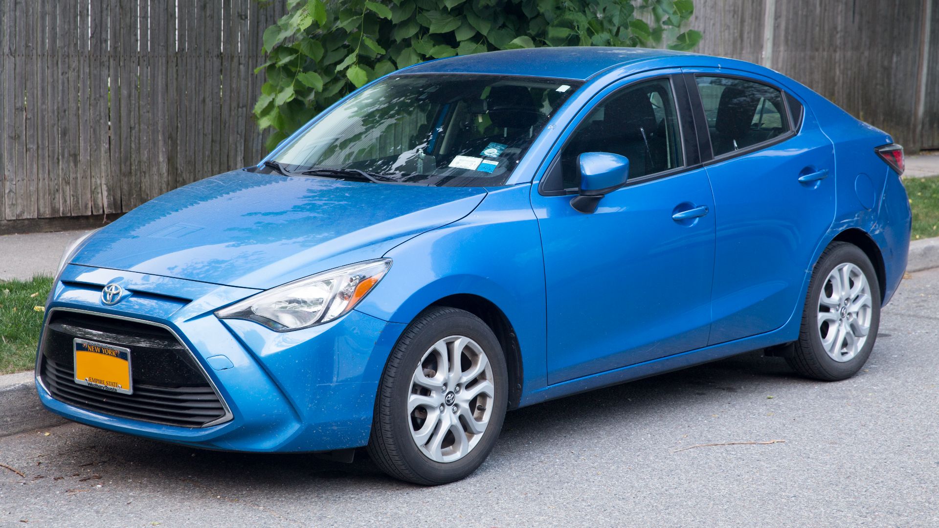 A 2017 Toyota Yaris iA in Blue. Six-speed manual (!), 1.5-litre inline-four, built in Salamanca, Guanajuato, Mexico.