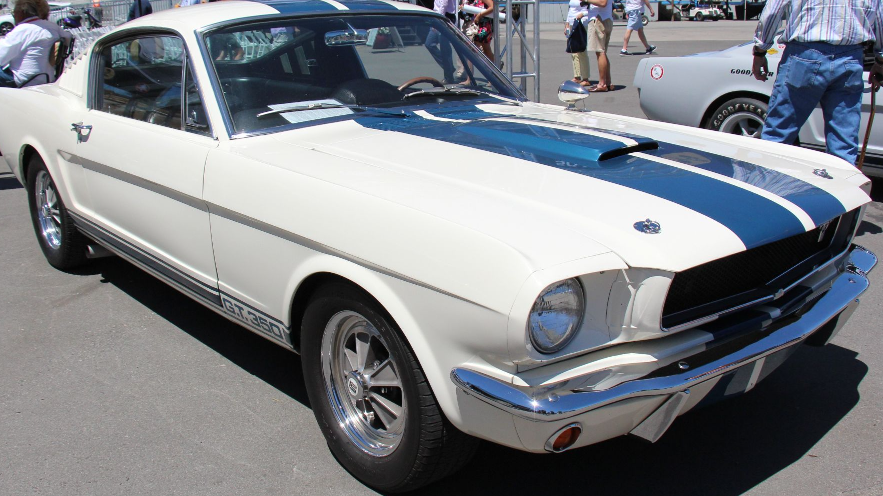 Ford, having seen the success Carroll Shelby had made of the Cobra race car, knew he was the man to make the Mustang a respected race machine. Mustang GT Fastbacks were delivered to Shelby, the back seat was removed, turning the Mustang into a 2 seater 's