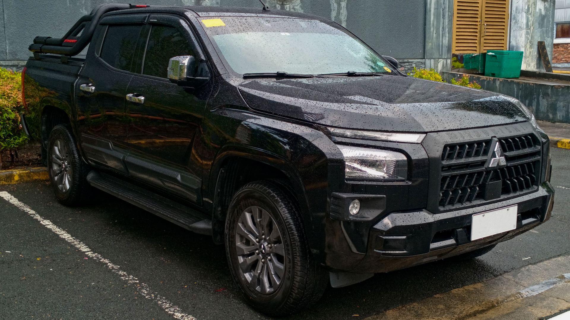 2024 Mitsubishi Triton 2.4 GLX 4x2 in Jet Black Mica, photographed in Westgate Center, Filinvest City, Muntinlupa, Metro Manila, PH.