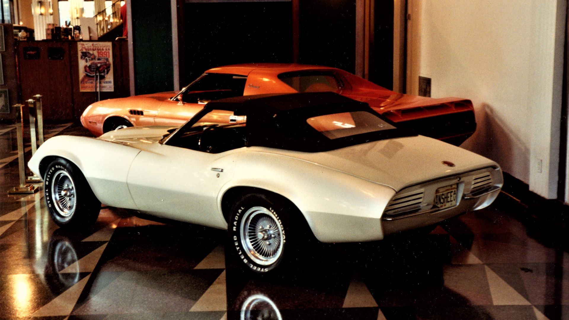 The car in the background is the 1971 Dodge Diamante concept car.