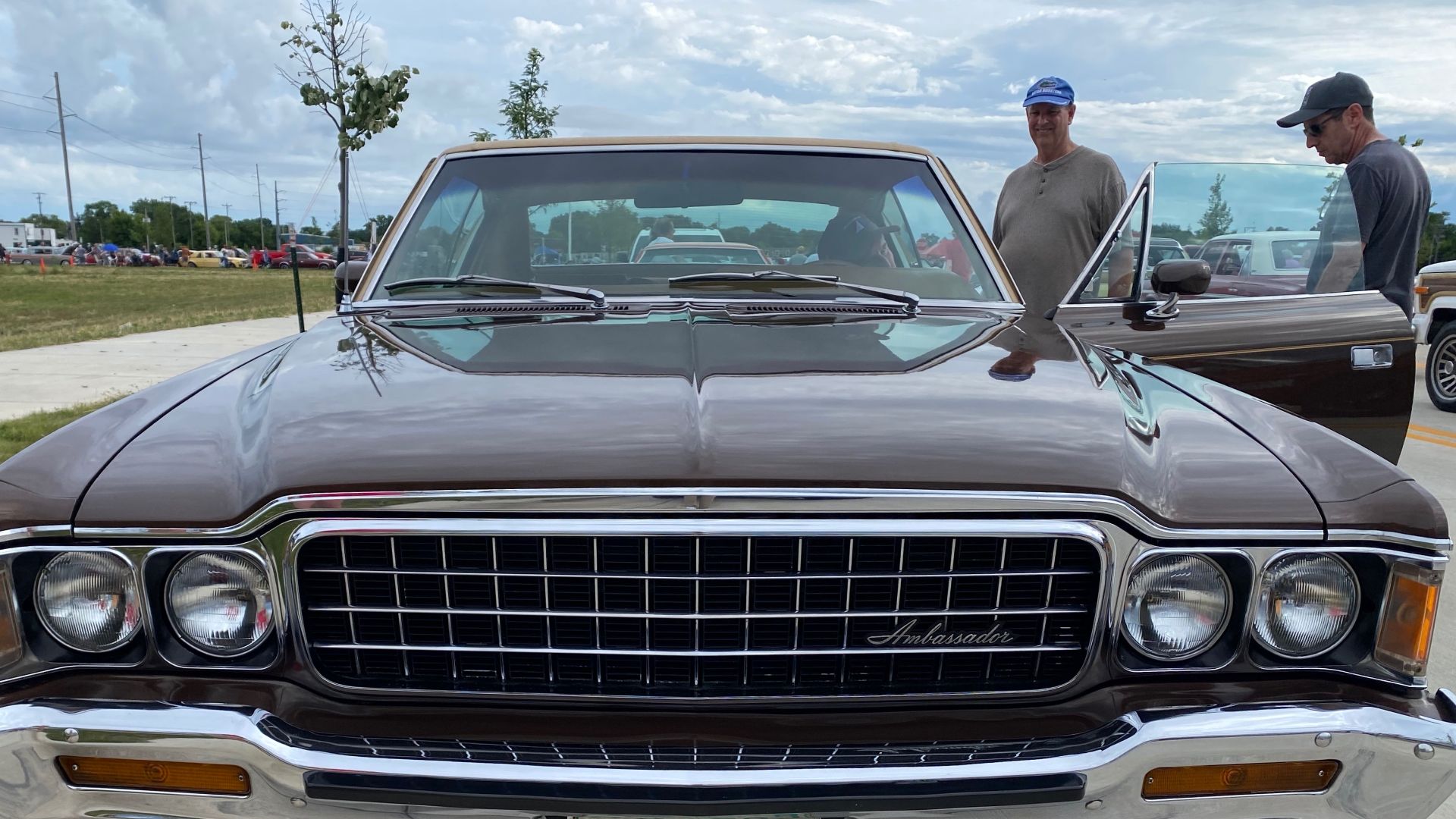 1973 AMC Ambassador Brougham two-door hardtop (no B-pillar). A full-sized, six-passenger, premium-level car made by American Motors Corporation (AMC). All 1973 Ambassadors came in one high-level