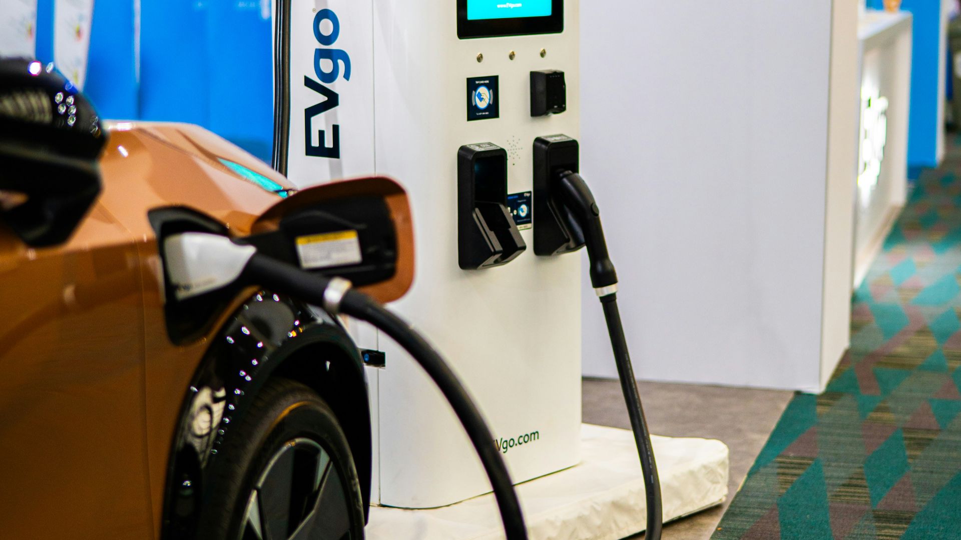 a close up of a car at a charging station