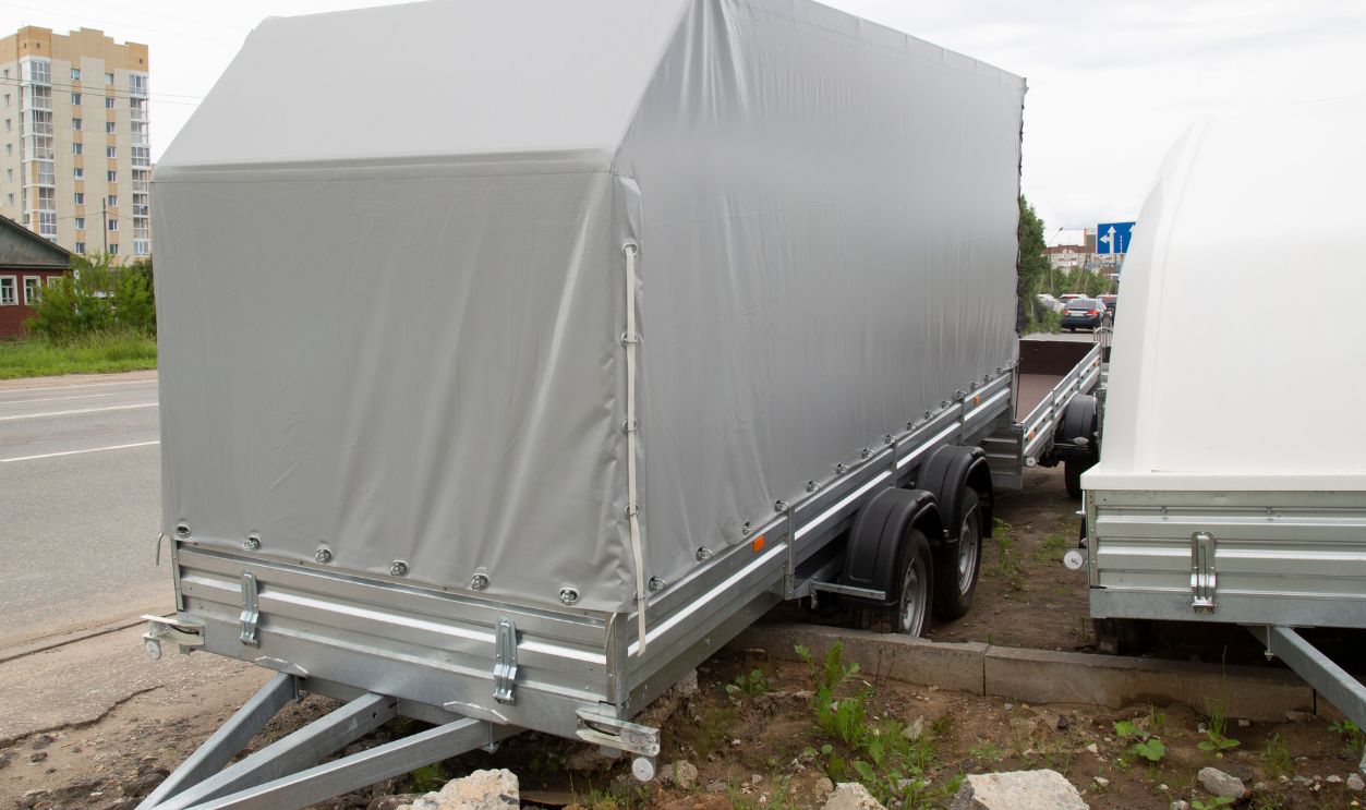 Open road trailer. Shop selling car trailers.