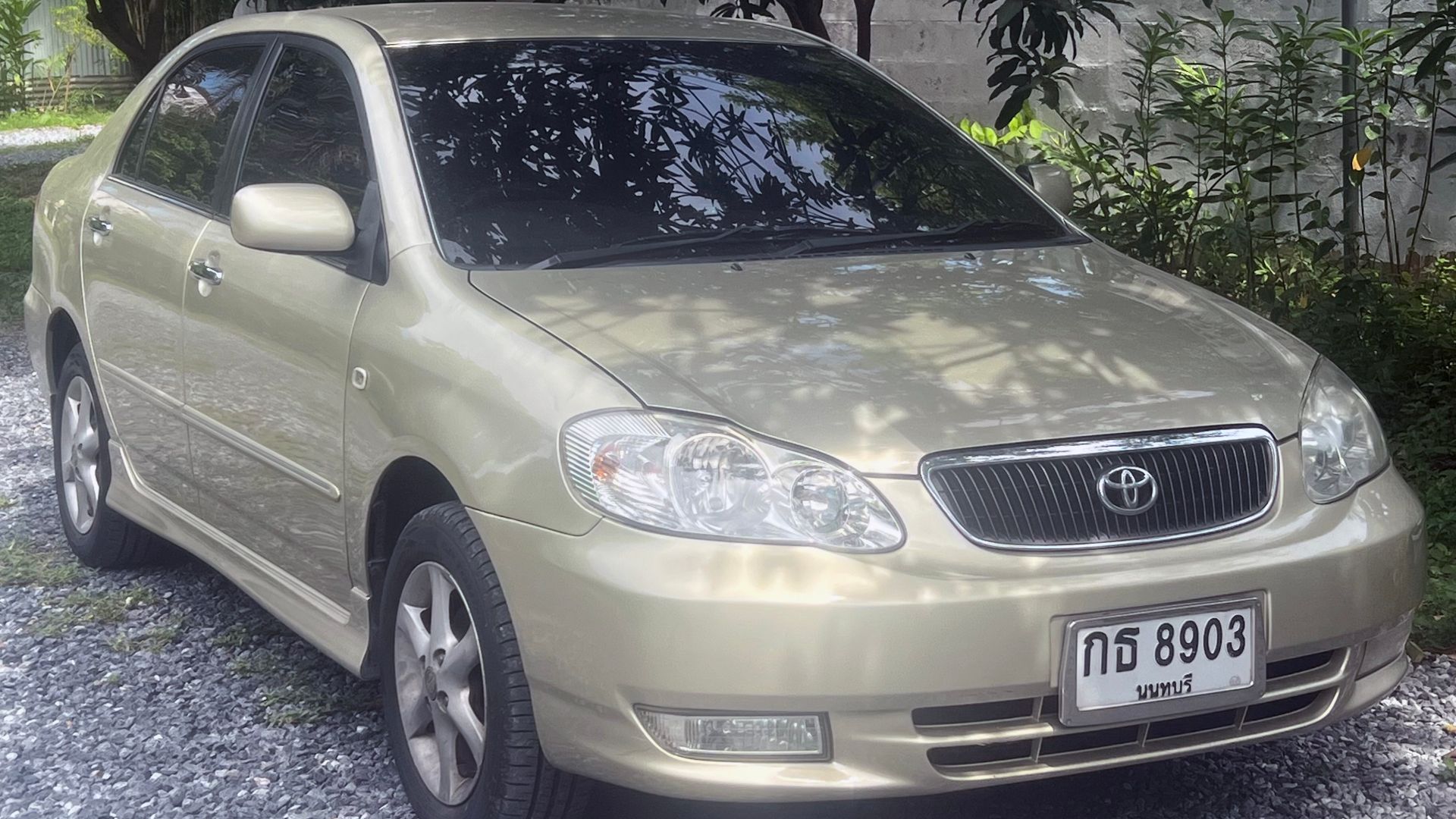 This is one of my uncle’s 2003 Toyota Corolla Altis and this car is a pretty beautiful car. I consider it a classic from the interior perspective but modern on the exterior perspective so I consider it a classic modern and the fact that this car is 20 yea