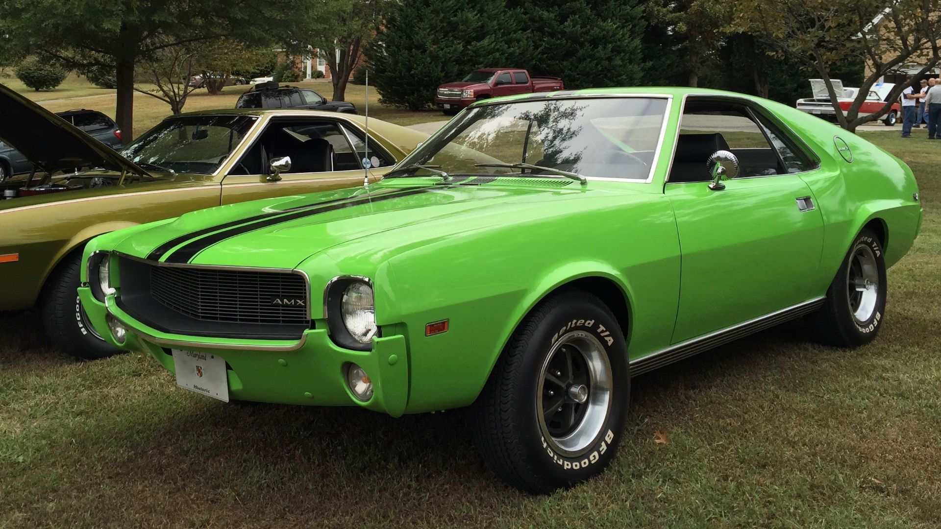 1969 AMC AMX, a two-seat muscle GT-type car built by American Motors Corporation in Kenosha, Wisconsin. It is finished in Big Bad Green, paint code P4 that was introduced for Spring 1969 - in mid-model year - and has the