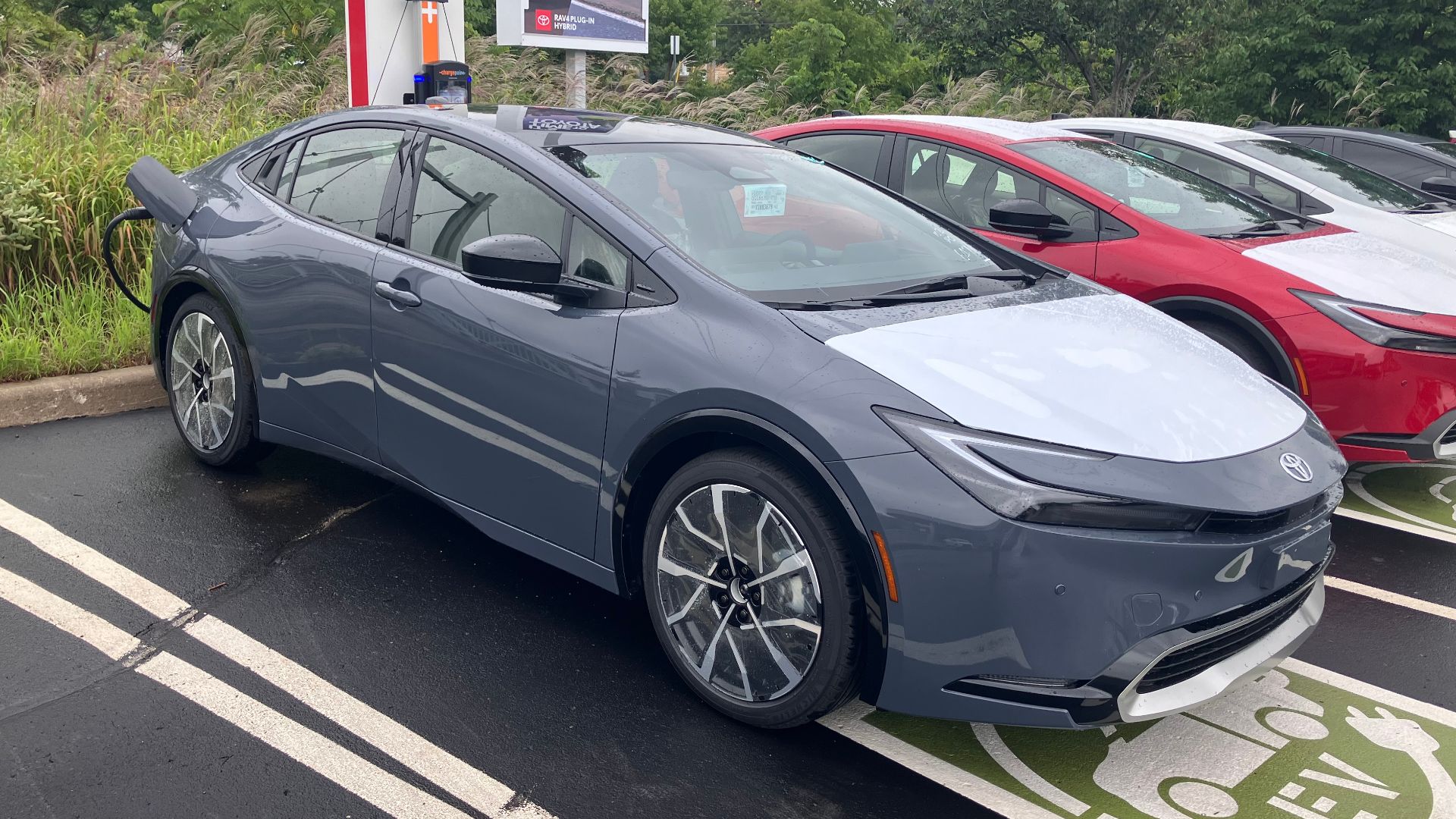 2026 Prius Plug-in Hybrid plugged into a charging station