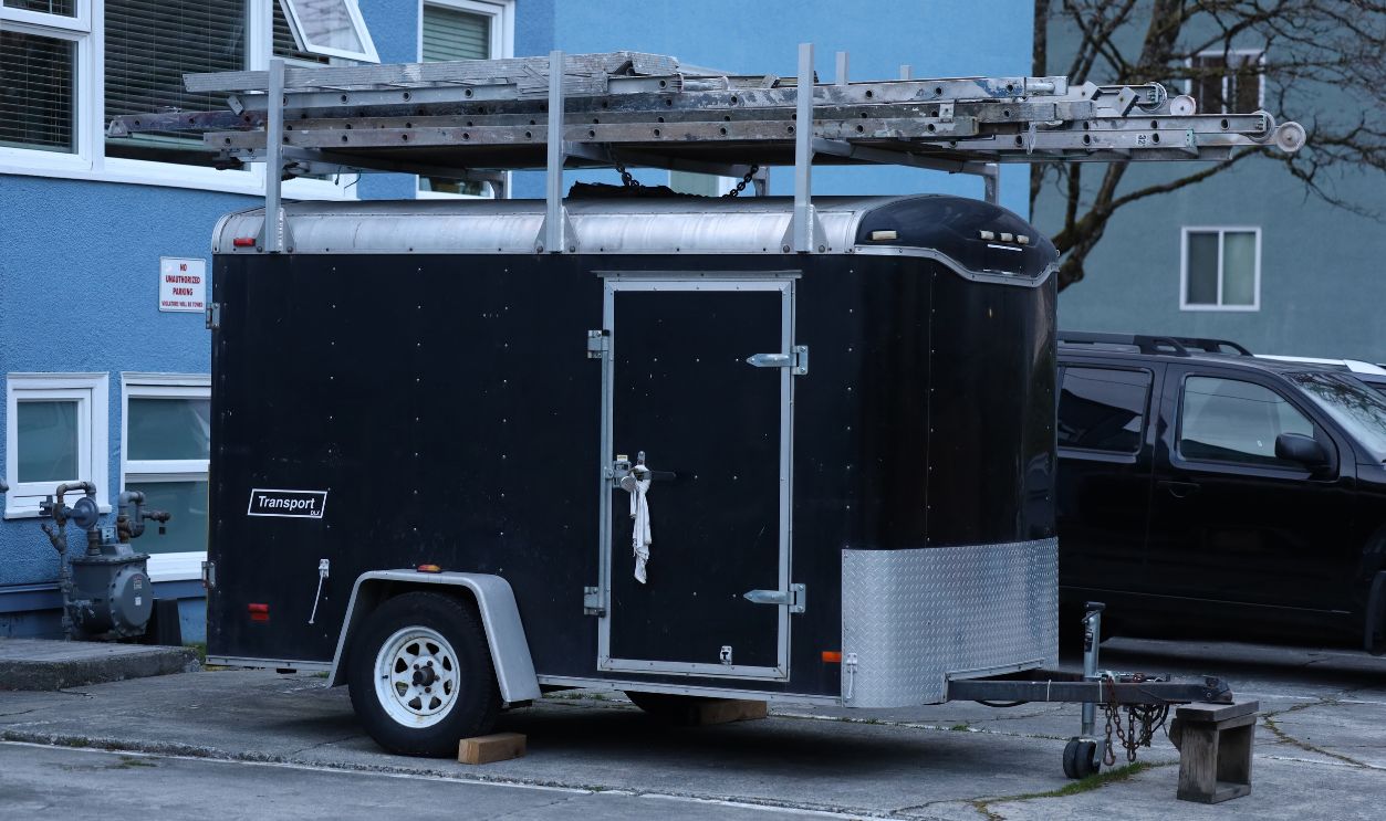 Vancouver, BC, Canada - March 4th 2022 - House. Trailer. Motorhome. Store materials. White. Black. All ready for the holidays. Leaving home on a weekend.