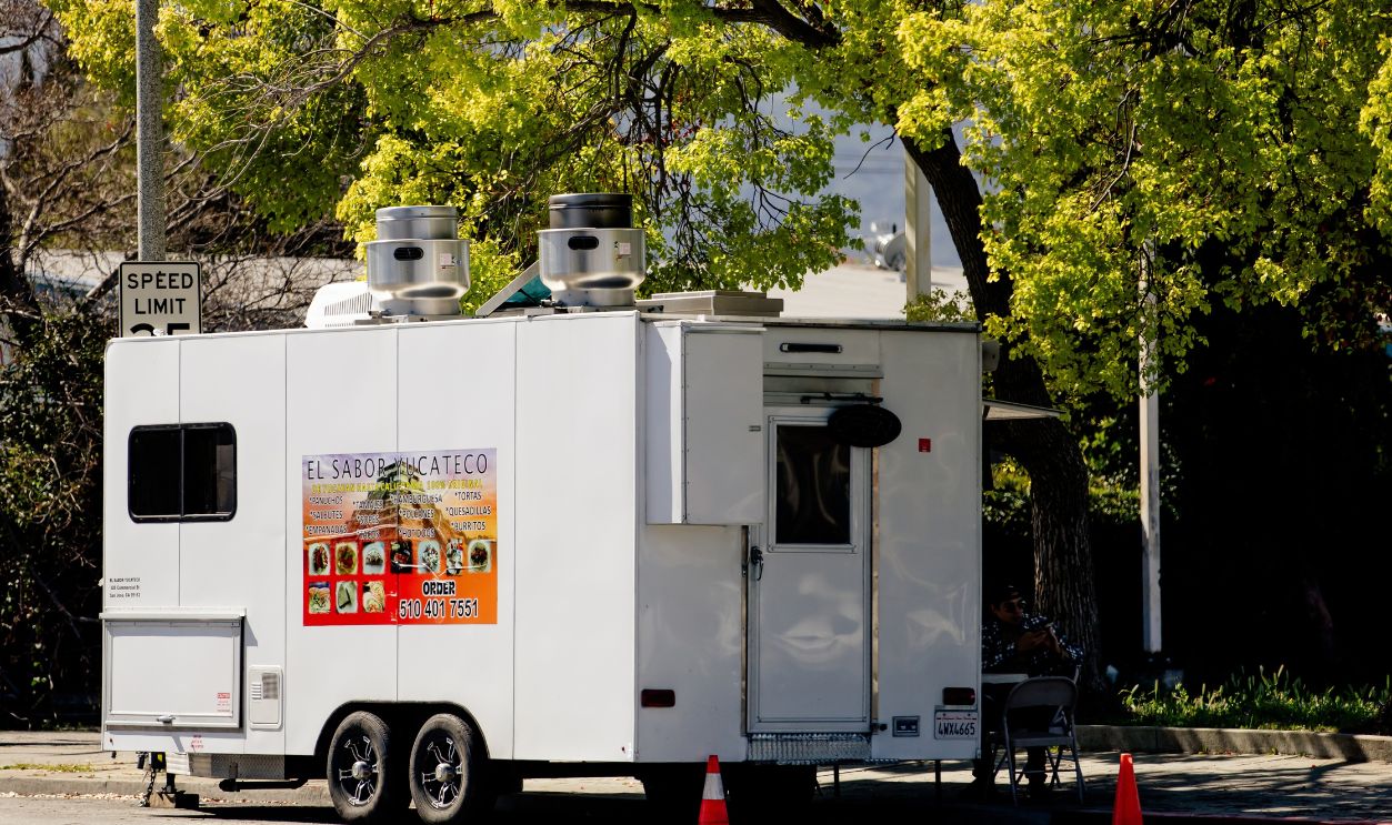 Sunnyvale, CA US - March 12, 2026: a food trailer parked on the side of a street with a custom-built mobile kitchen, often used for high-volume service at festivals, street events, or as a stationary business.