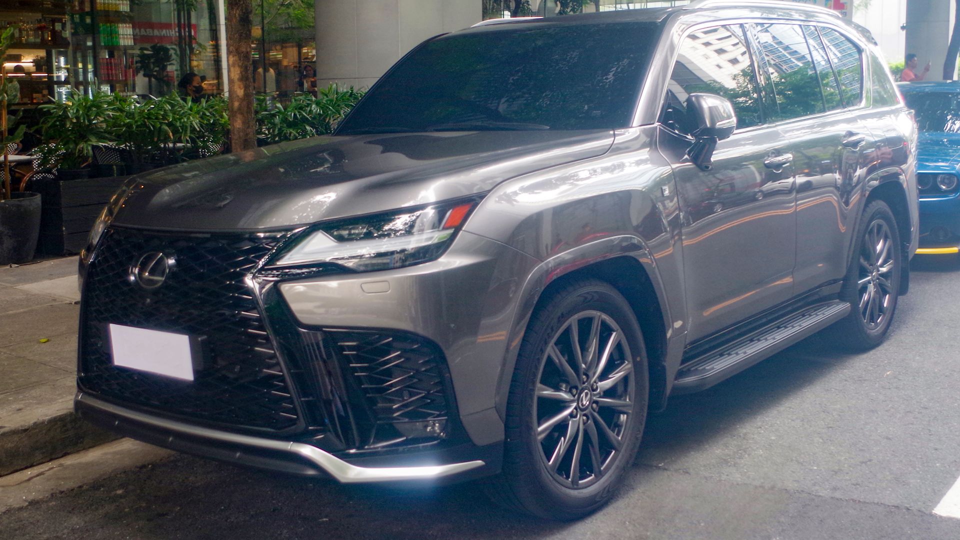 File:2024 Lexus LX 500d F Sport in Sonic Titanium, front right.jpg