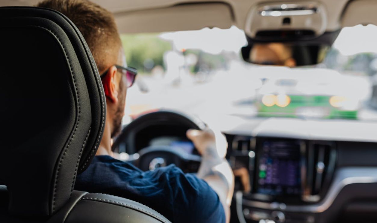Man Driving Modern Car