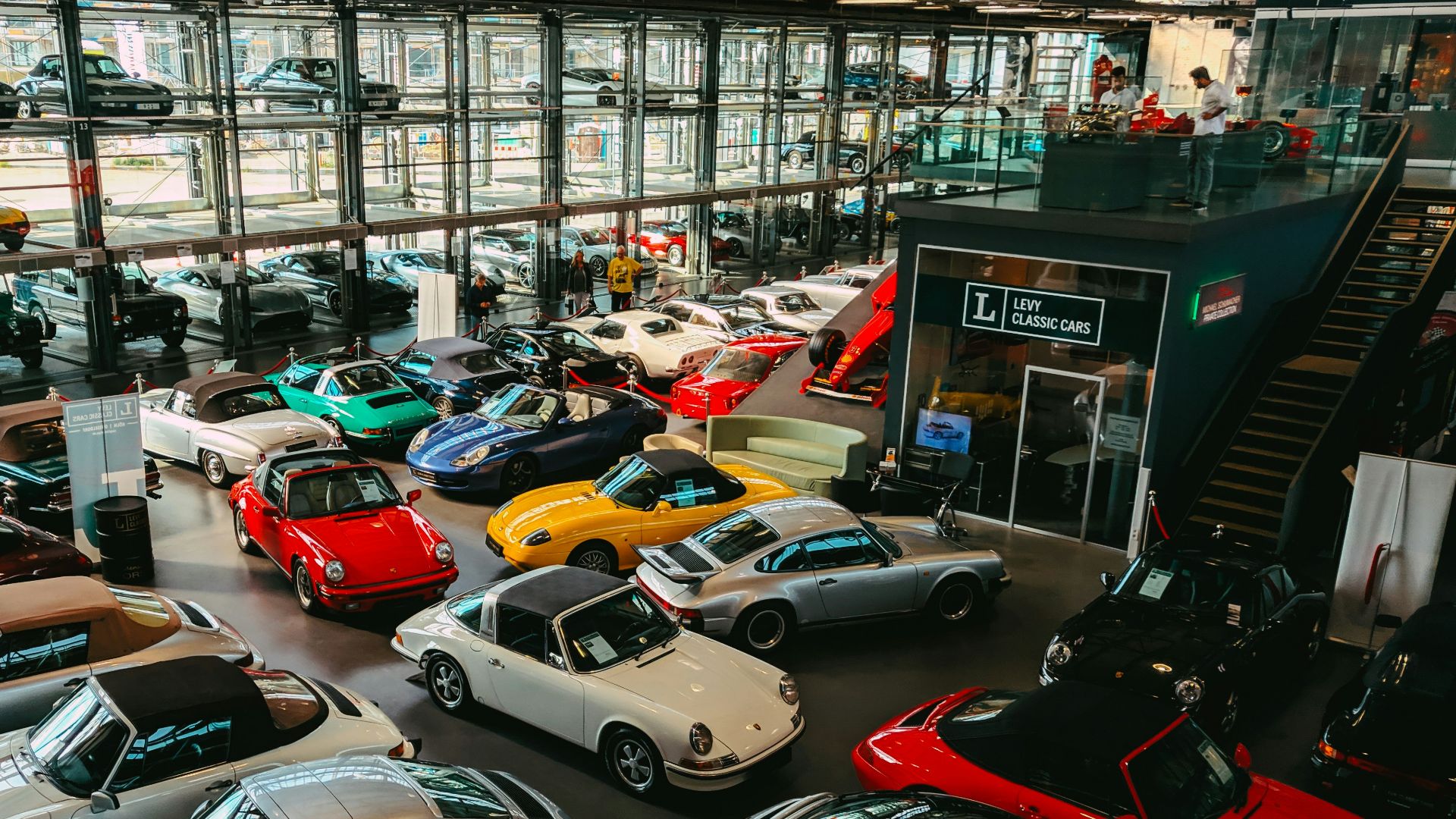 cars parked in front of building during daytime