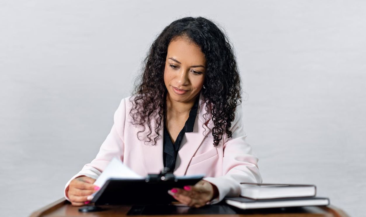 A Woman Looking the Contract